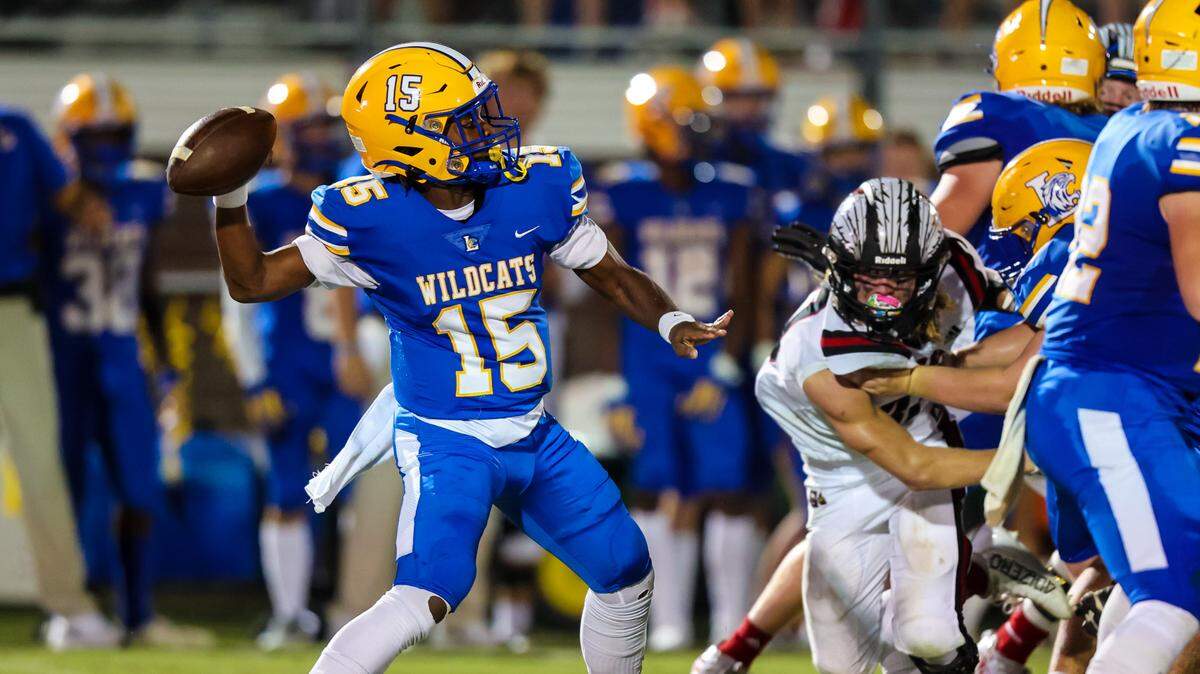 Lexington Wildcats quarterback Taiden Mines (15) passes during their game against the Gilbert Indians at Lexington High School Friday, Sept. 16, 2022.