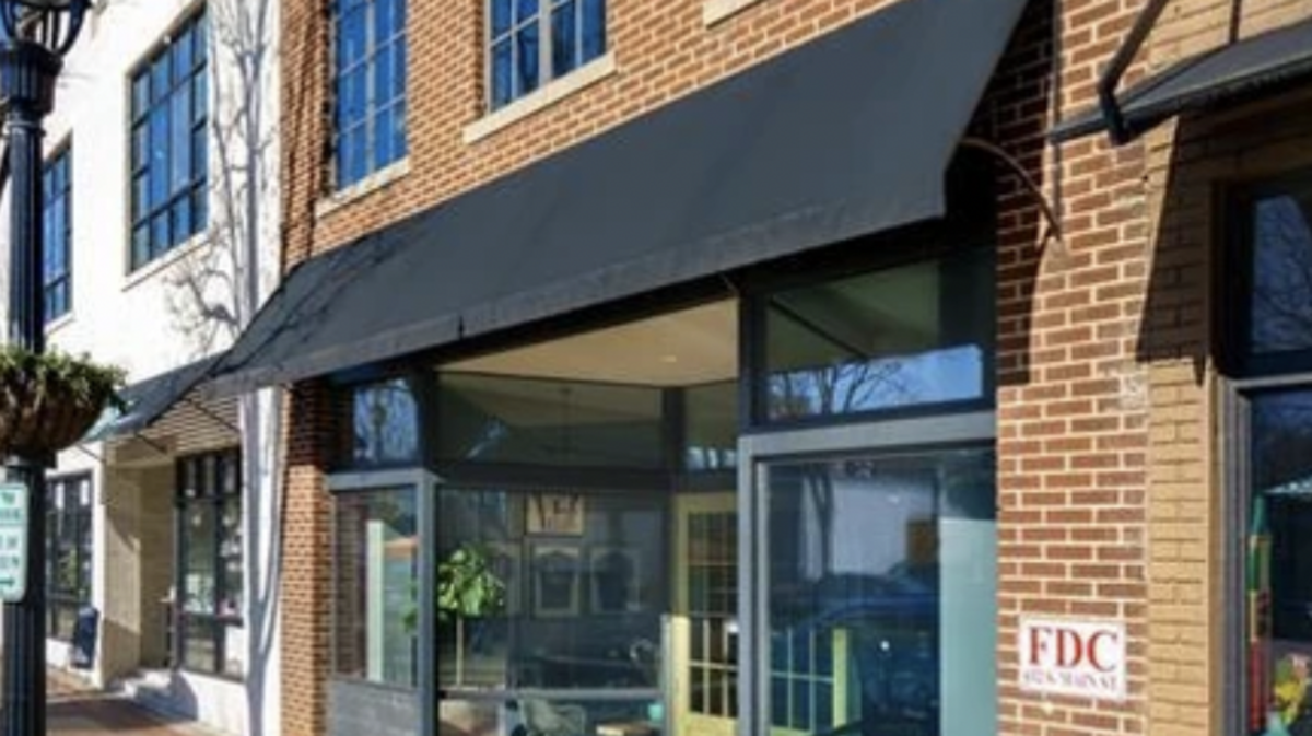 The building has served as a retail storage facility and art gallery before being renovated for office and residence.