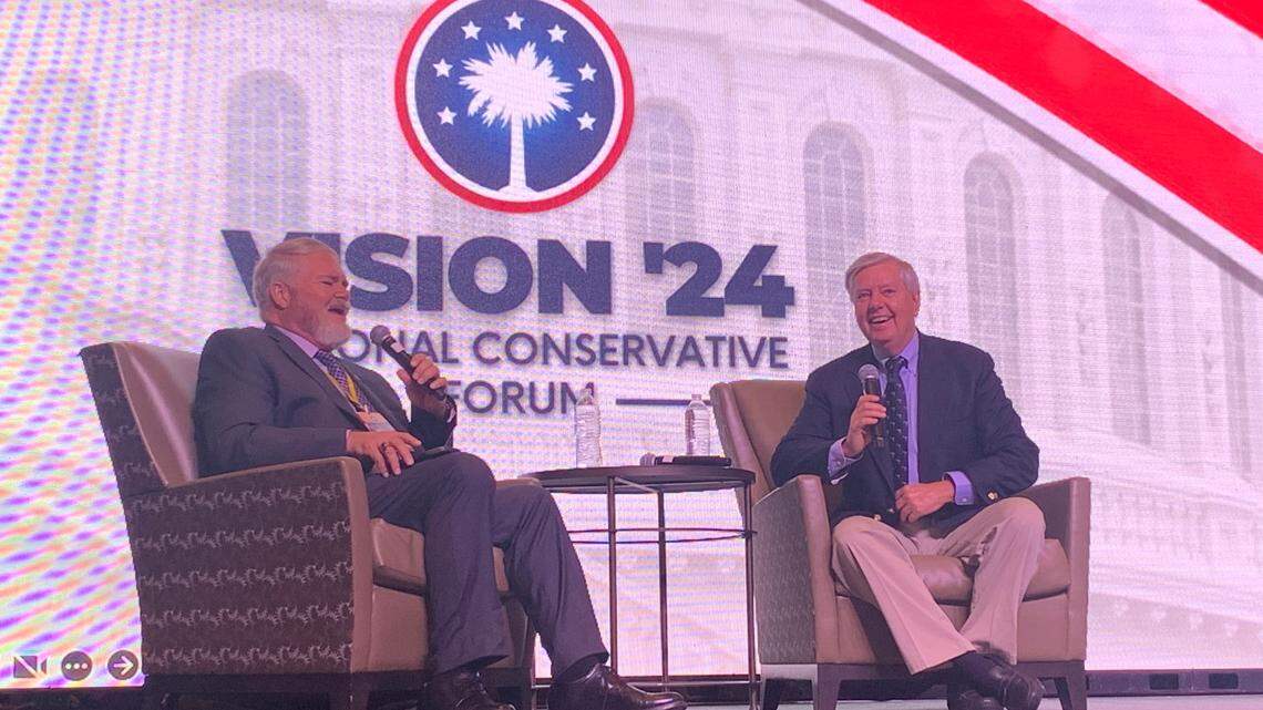 U.S. Sen. Lindsey Graham, right, speaks Saturday, March 18, 2023, in North Charleston, S.C., at the Palmetto Family Council’s Vision ’24 conference with Chairman Tony Beam.