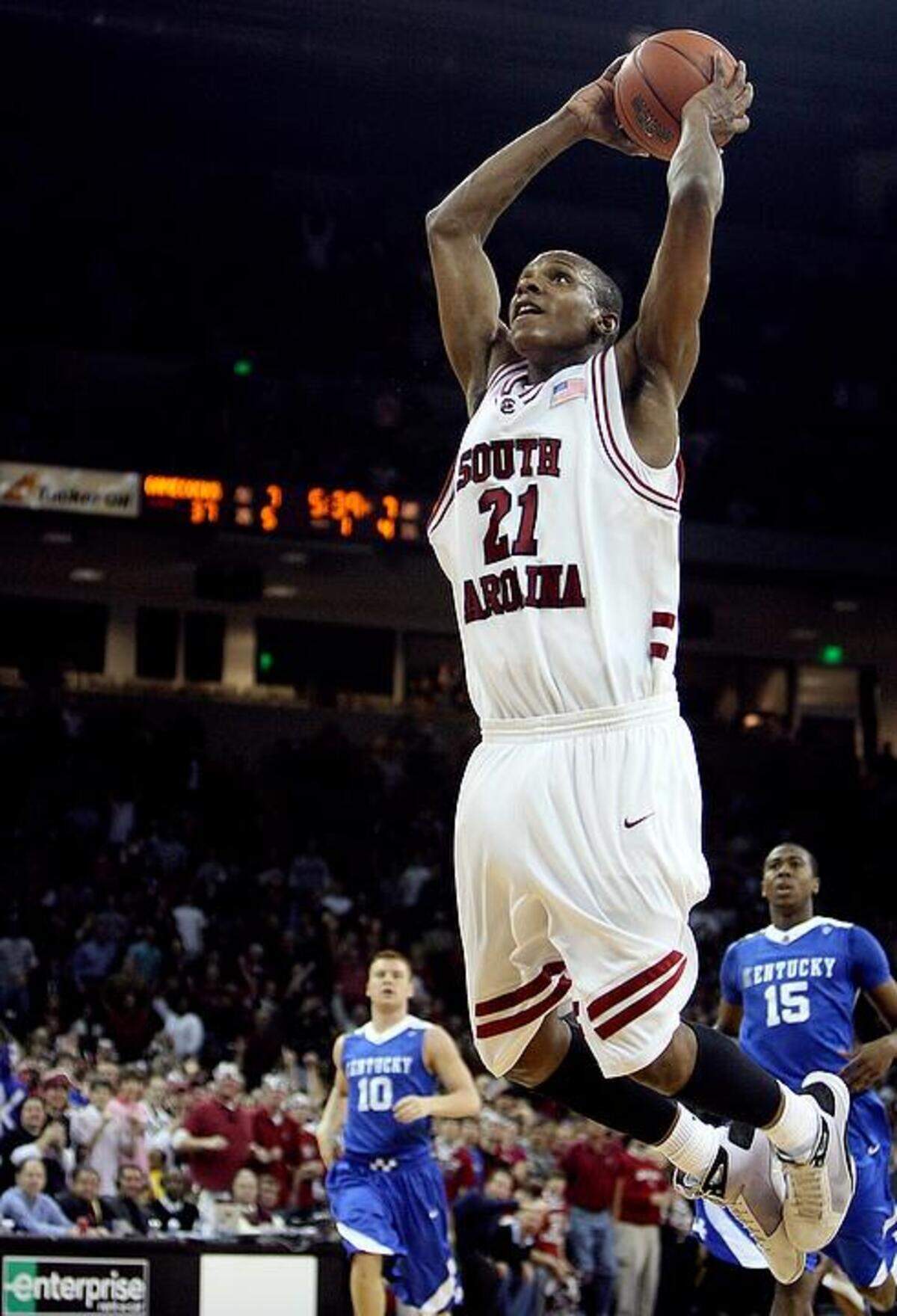 USC's Dominique Archie makes a slam dunk against Kentucky in the first period at the Colonial Life Arena.