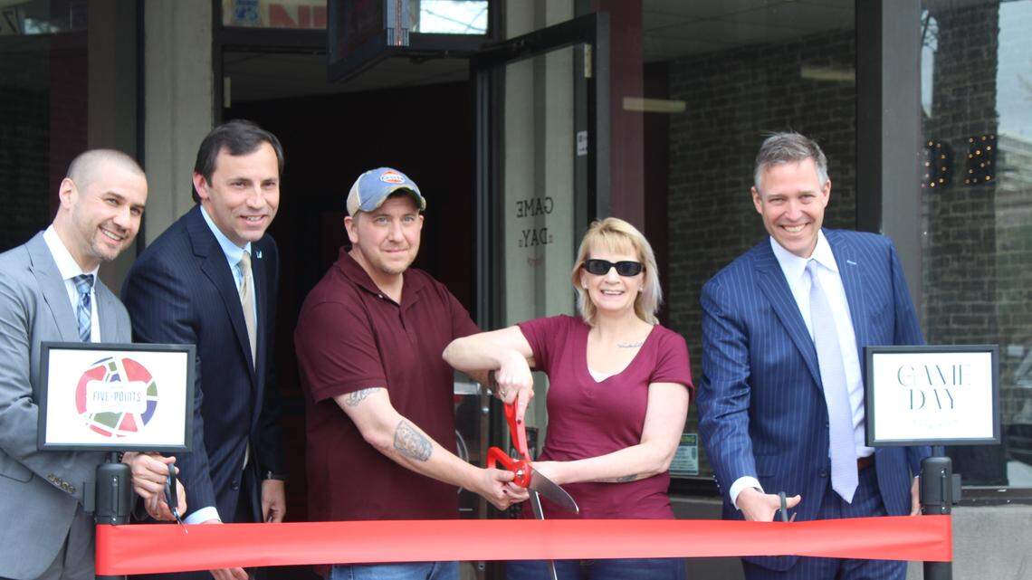 Columbia Mayor Daniel Rickenmann and district 3 City Councilman Will Brennan join Game Day Nutrition owners Amanda Murray and Shawn Rhives for their grand opening March 7, 2022.