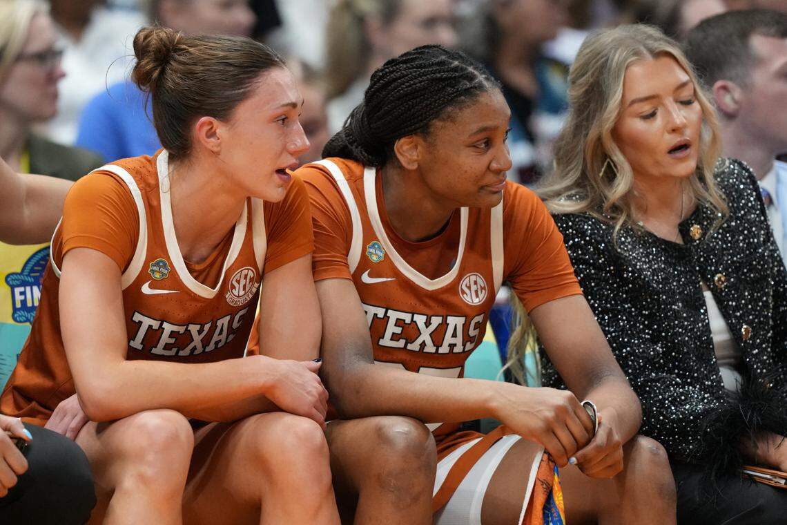 Apr 4, 2025; Tampa, FL, USA; Texas Longhorns guard Shay Holle (10) and forward Madison Booker (35) react during the semifinal of the women’s 2025 NCAA tournament against the South Carolina Gamecocks at Amalie Arena.