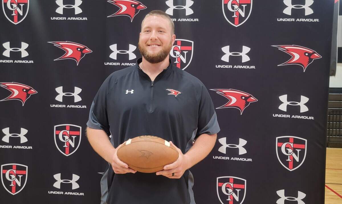 Cory Helms was introduced as the new Cardinal Newman football coach on May 4, 2022.