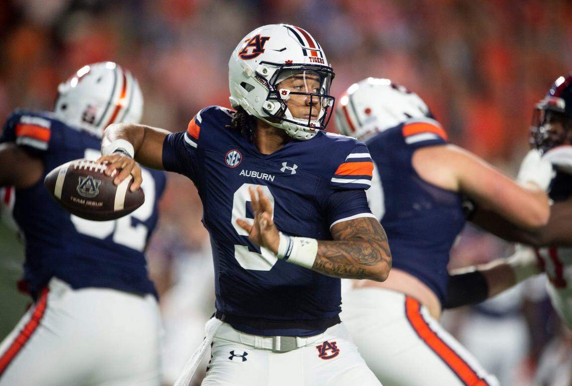 Auburn Tigers quarterback Robby Ashford (9) drops back to pass in the first quarter Auburn Tigers take on Mississippi Rebels at Jordan-Hare Stadium in Auburn, Ala., on Saturday, Oct. 21, 2023.