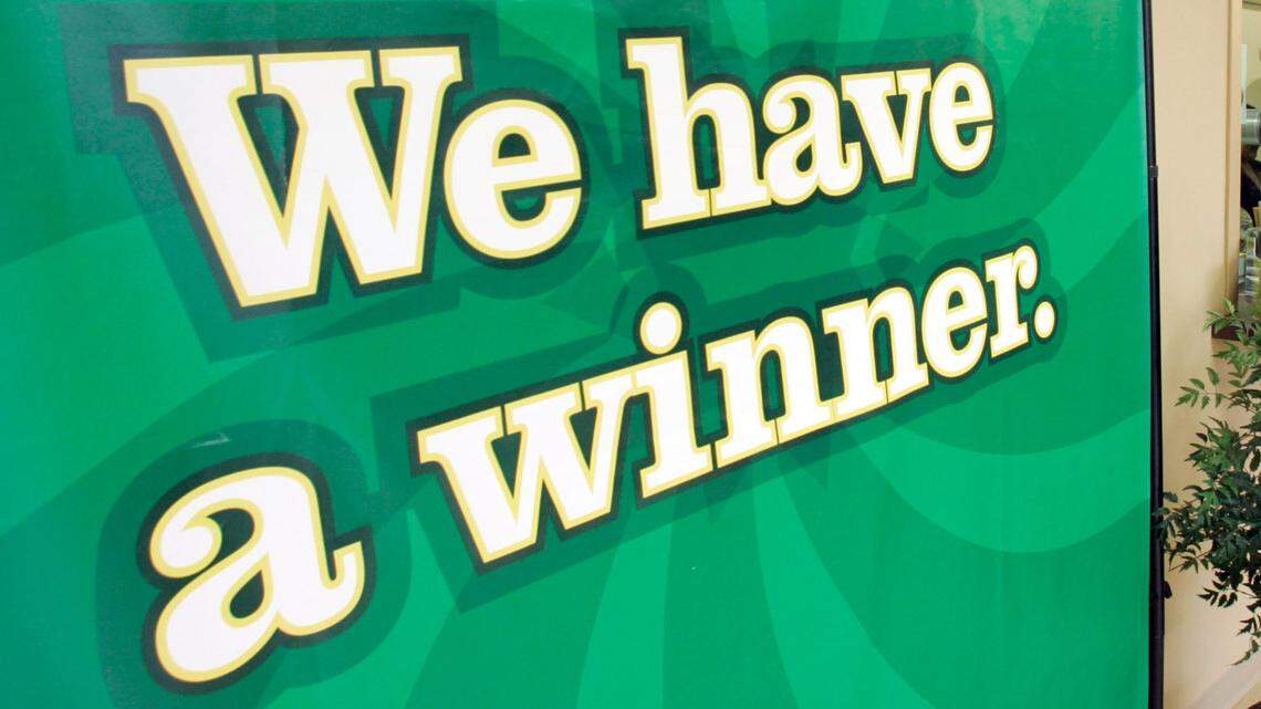 She picked up her husband at home and made a beeline to cash the prize, South Carolina lottery officials said.