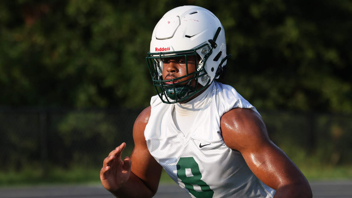 Dutch Fork defensive end Julian Walker (8) runs drills during practice at Dutch Fork in Irmo.