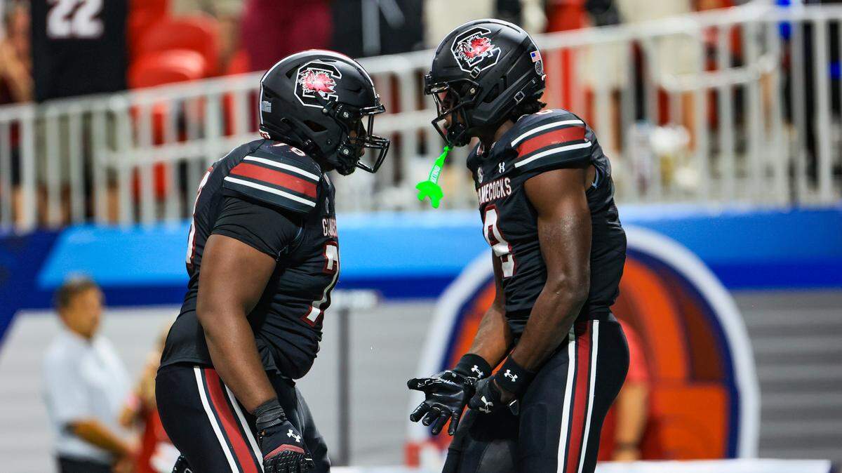 South Carolina wide receiver Nyck Harbor (8) and South Carolina offensive lineman Trovon Baugh (78) celebrate scoring against Virginia Tech in the 2025 Aflac Kickoff Game at the Mercedes-Benz Stadium in Atlanta, Georgia on Sunday, August 31, 2025.