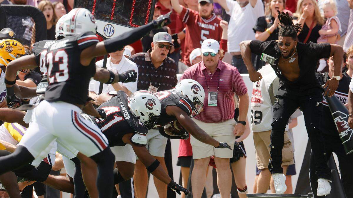 University of South Carolina defensive back Buddy Mack III (33) returns a blocked punt against the Louisiana State University Tigers at Williams-Brice Stadium on Saturday, September 14, 2024.