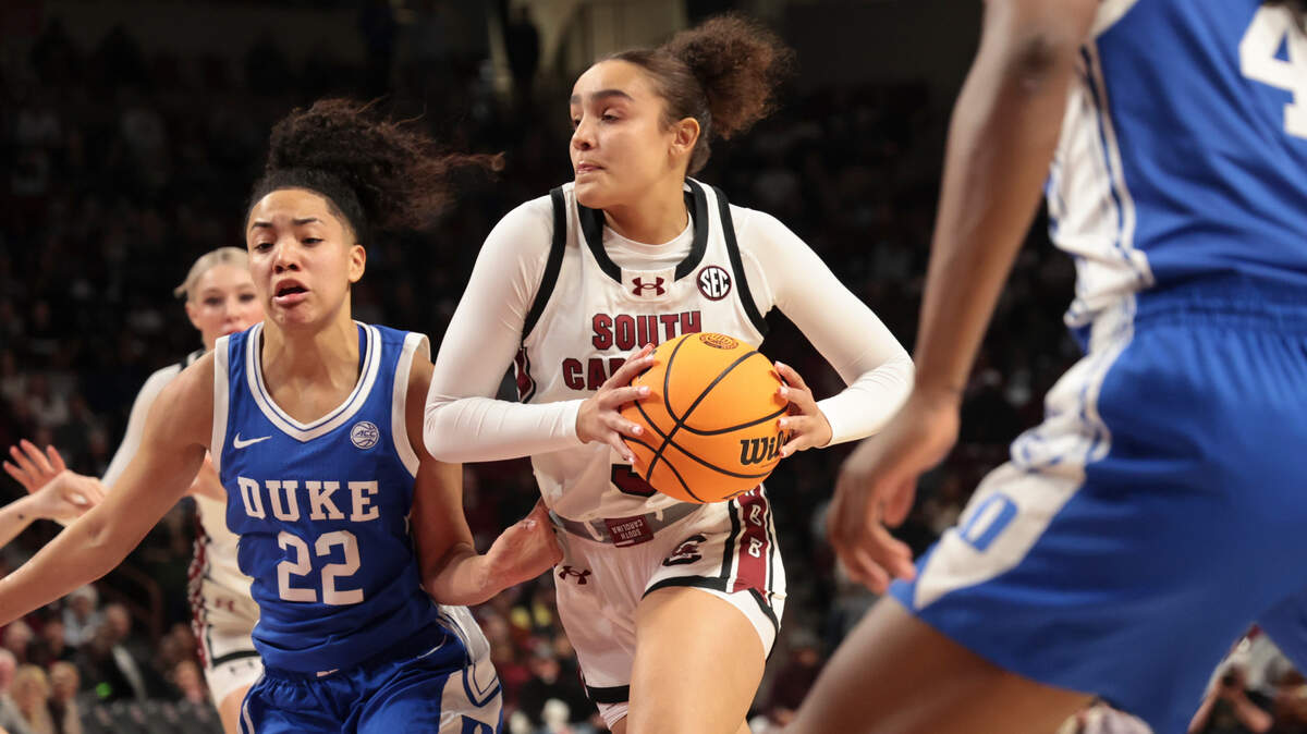 University of South Carolina guard Tessa Johnson (5) drives through Duke defenders including Taina Mair (22) during the first half of action in the Colonial Life Arena on Thursday Dec. 5, 2024.