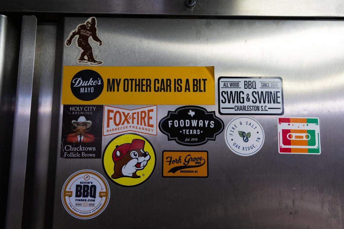 Stickers on a cabinet at City Limits Barbeque in West Columbia, on Friday, March 28, 2025.