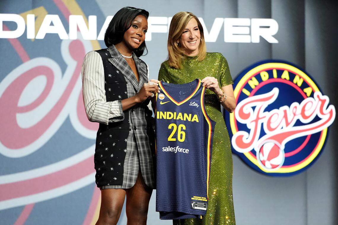 Raven Johnson of South Carolina poses with WNBA Commissioner Cathy Engelbert after being selected with the 10th pick in the first round by the Indiana Fever during the 2026 WNBA Draft at The Shed on April 13, 2026 in New York City.