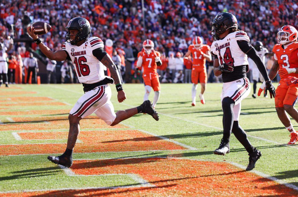 South Carolina quarterback LaNorris Sellers (16) carries the ball in for the game-winning touchdown during the second half of the Palmetto Bowl between South Carolina and Clemson at Memorial Stadium in Clemson on Saturday, November 30, 2024.