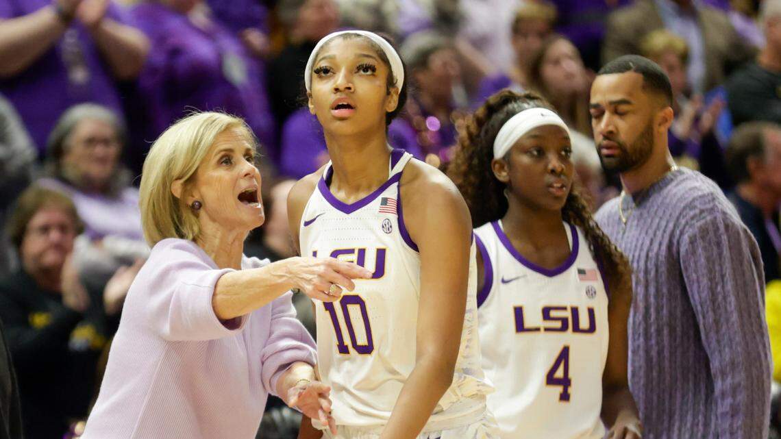 LSU head coach Kim Mulkey talks with forward Angel Reese (10) in the second half of an NCAA college basketball game against the Georgia in Baton Rouge, La., Thursday, Feb. 2, 2023. (AP Photo/Derick Hingle)