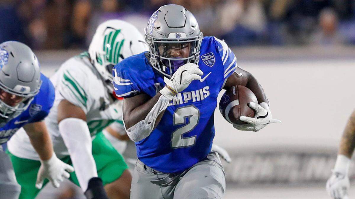 Memphis Running Back Mario Anderson Jr. (2) breaks free as he completes a 42-yard touchdown run, giving the Tigers a 27-21 lead during the NCAA Football match between the Memphis Tigers and the North Texas Mean Green inside Simmons Bank Liberty Stadium, Memphis, Tenn., on Saturday, Oct. 19, 2024.