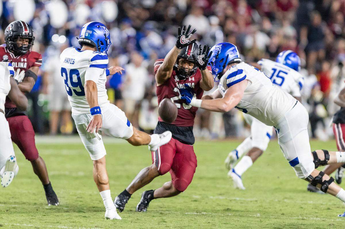 South Carolina’s Rashad Amos (23) blocks a punt by Georgia State kicker Michael Hayes (39) at Williams-Brice Stadium in Columbia, SC on Saturday, Sept. 3, 2022.