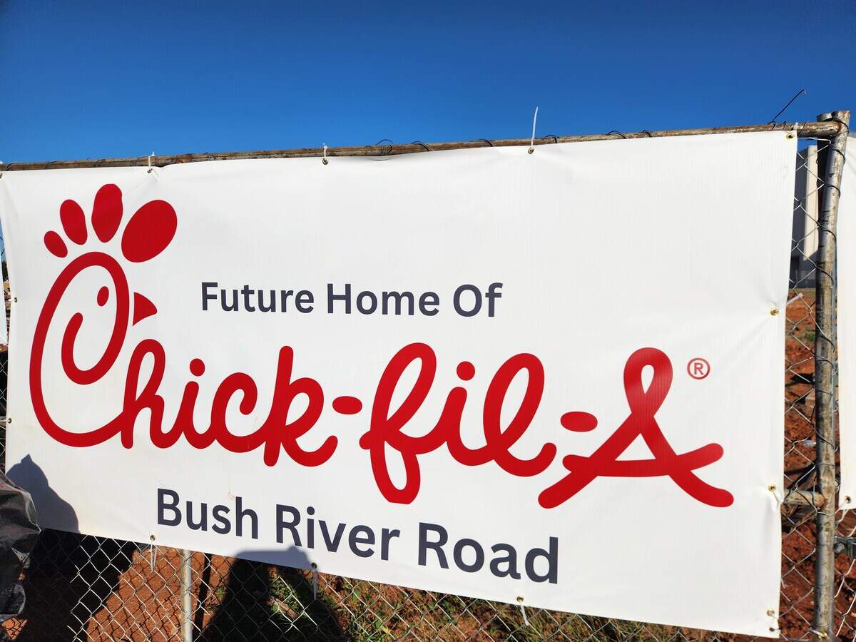 A sign announces the coming of a newly built Chick-fil-A on Bush River Road, in the southwest corner of the Dutch Square mall parking lot.
