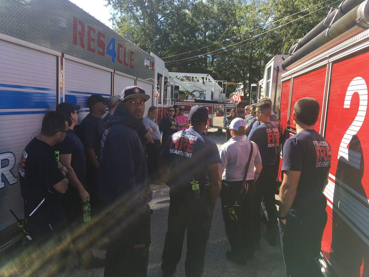 Captain Jason Joannides of Columbia Fire Department talks to crews before a training exercise.