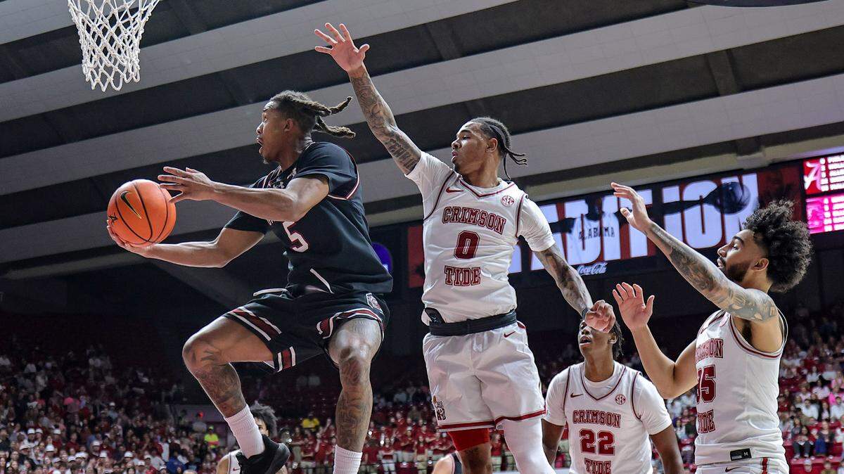 Meechie Johnson #5 of the South Carolina Gamecocks shoots against the Alabama Crimson Tide in the first half at Coleman Coliseum on February 14, 2026 in Tuscaloosa, Alabama.