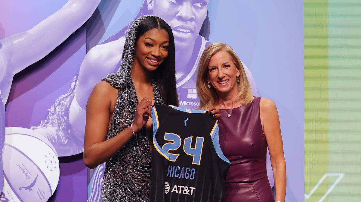 Angel Reese poses with WNBA commissioner Cathy Engelbert after she is selected with the number seven overall pick to the Chicago Sky n the 2024 WNBA Draft at Brooklyn Academy of Music.