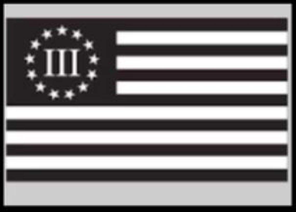 This file image shows a Three Percenters logo, and the Columbia Police Department said an officer had a similar image on a sticker on his personal vehicle.