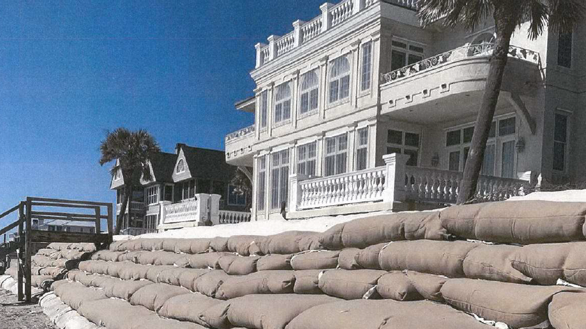 This home at Debordieu Beach, SC, is being protected by a wall of sand bags. Critics say that’s against state policy and bad for the beach.