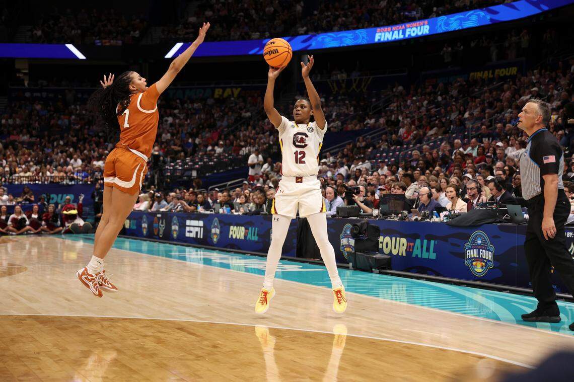 University of South Carolina’s MiLaysia Fulwiley (12) shoots as three-pointer during the first half of action as Texas’ Jordan Lee (7) defends at Amalie Arena in Tampa, Fla. on Friday, April 4, 2025.