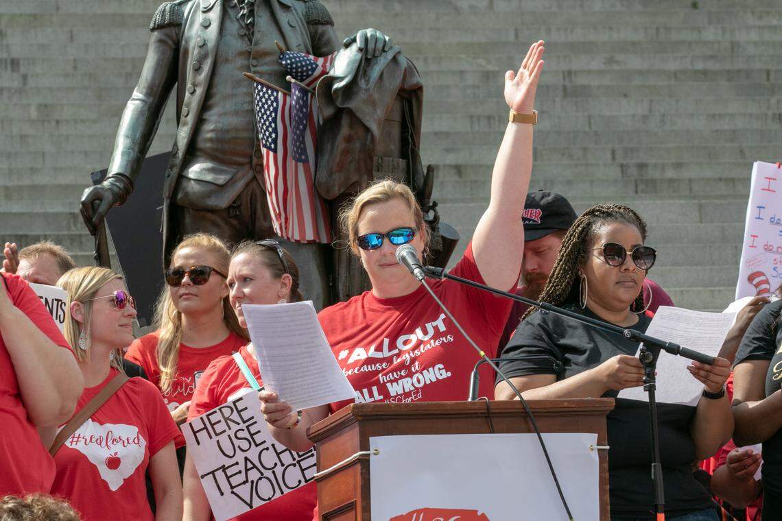 Lisa Ellis, founder of SCforEd and teacher talks to the crowd of 10,000 teachers, students and supporters who gathered for a rally at the South Carolina State House. 5/1/19