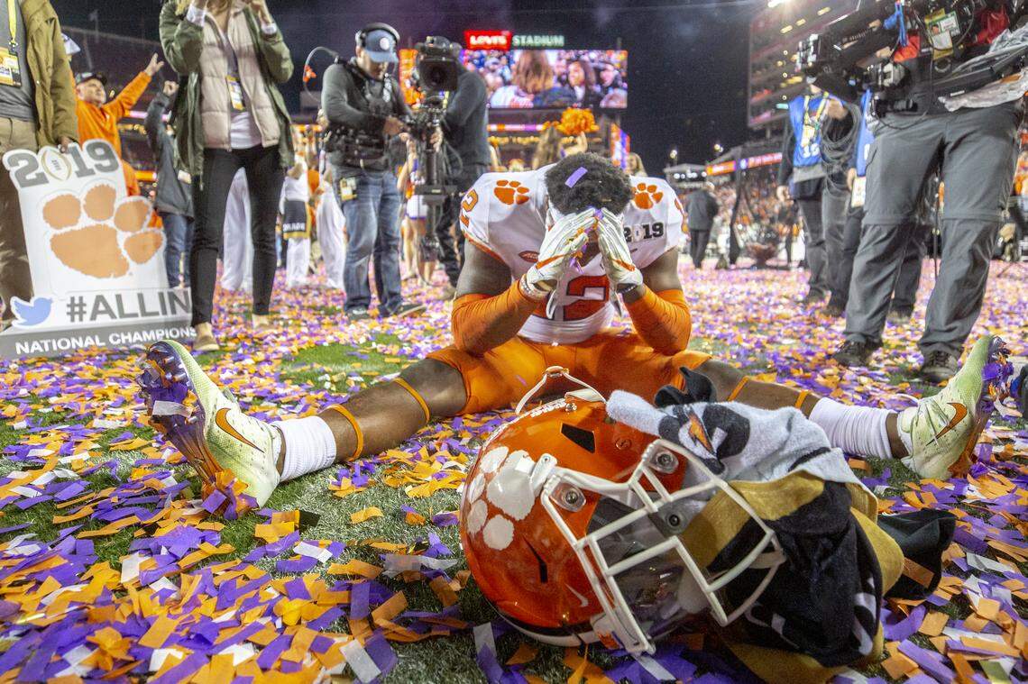 Clemson Tigers defensive back K’Von Wallace (12) sits down in confetti after Clemson beat Alabama to win the College Football Playoff National Championship at Levi’s Stadium on Monday Jan. 7, 2019, in Santa Clara, CA.