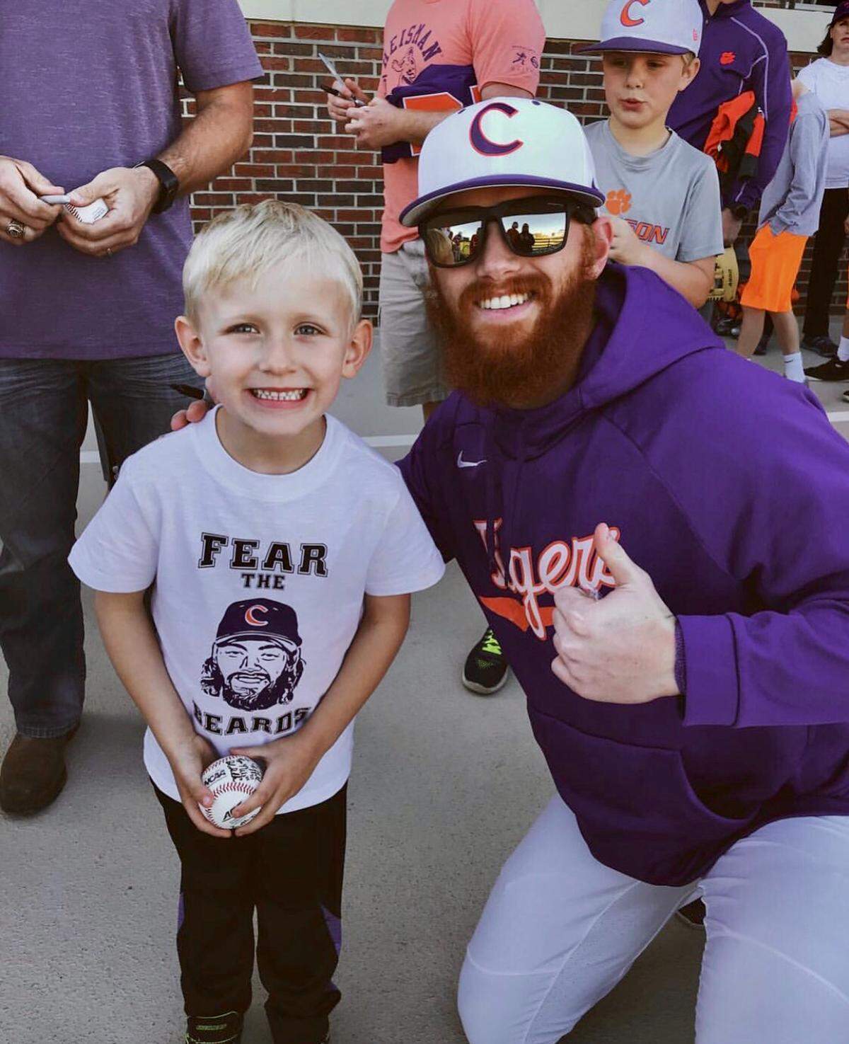 Grayson Byrd and a young Clemson fan