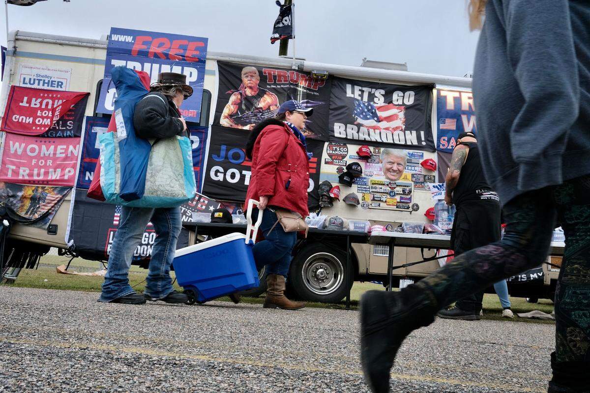 Supporters gather hours ahead of former President Donald Trump’s rally in Florence, S.C., on Saturday, March 12, 2022.