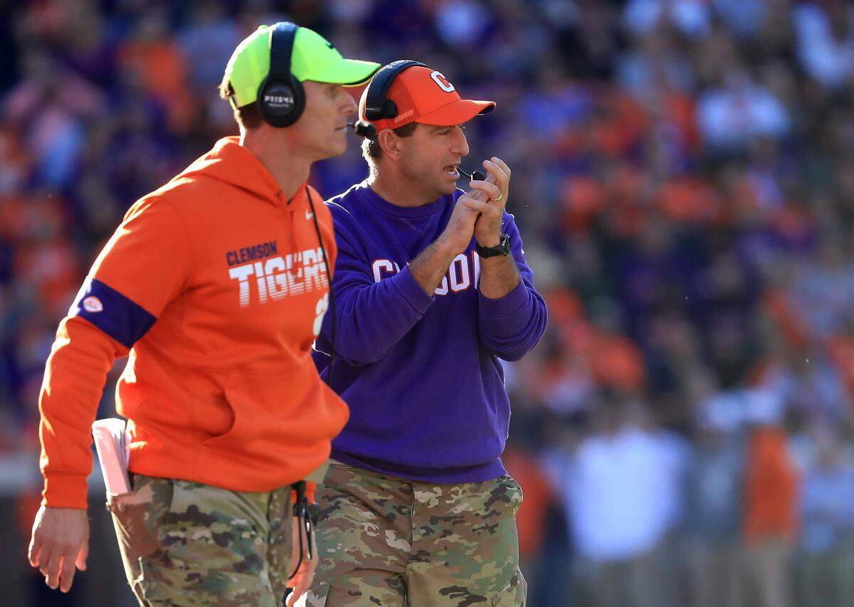 Brent Venables (left), widely considered one of the best defensive minds in the sport, spent about 20 years as a star defensive coordinator at Oklahoma and Clemson and coached in eight combined national championships before accepting his first head coaching job at OU in 2021.