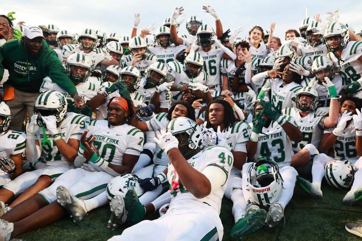 Dutch Fork celebrates defeating Summerville at S.C. State in the Class 5A Division 1 championship on Friday, December 13, 2024.