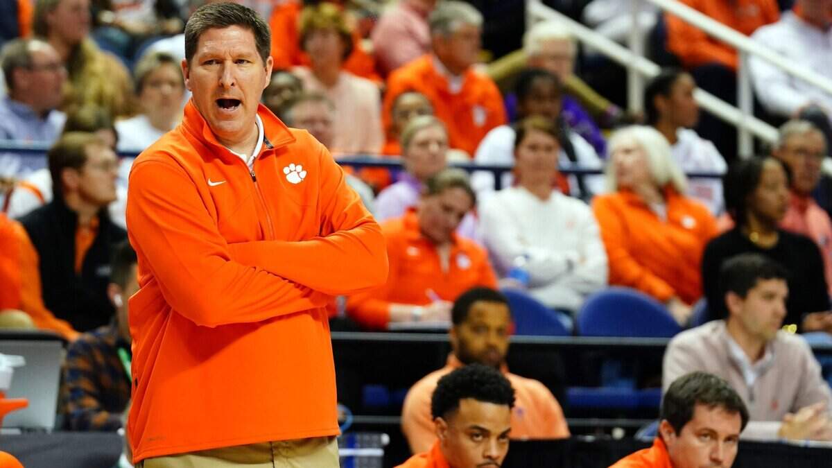 Mar 10, 2023; Greensboro, NC, USA; Clemson Tigers head coach Brad Brownell shouts to his players against the Virginia Cavaliers during the first half of the semifinals of the ACC tournament at Greensboro Coliseum.