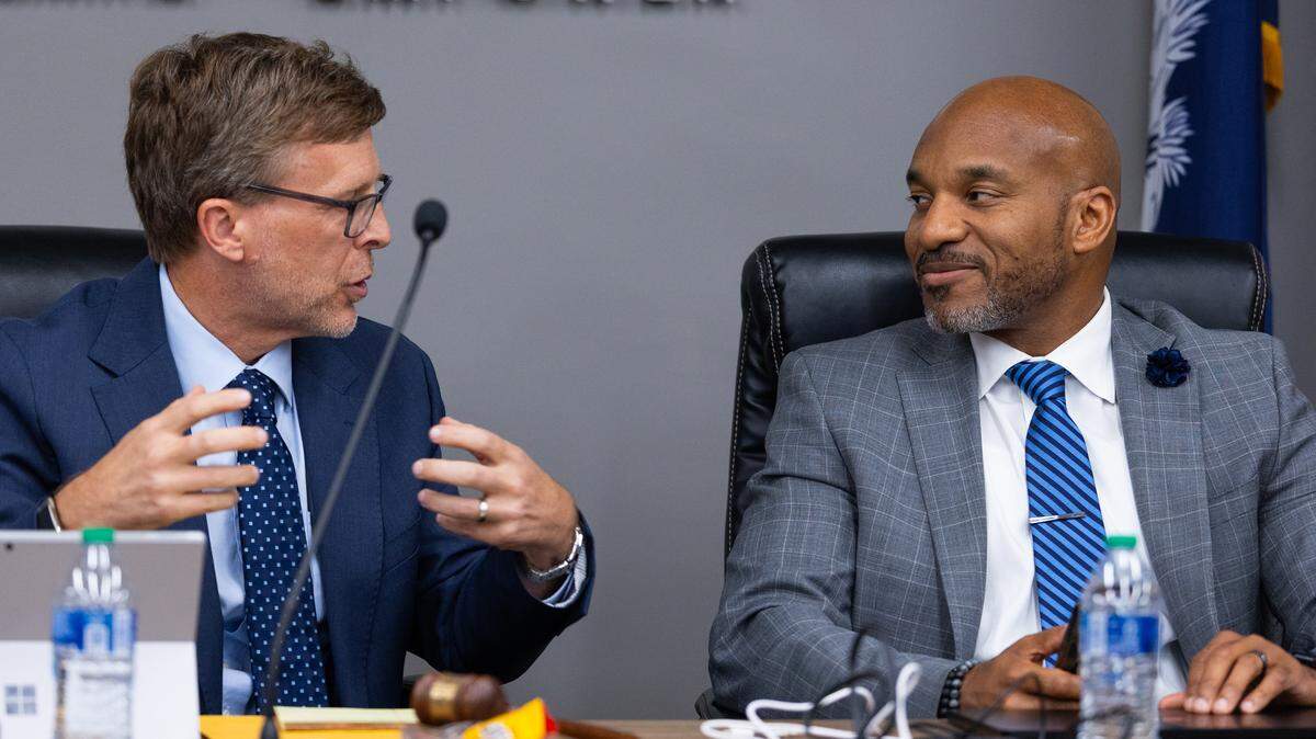 The Richland 1 School Board chair Robert Lominack speaks with Superintendent Todd Walker during a board meeting on Tuesday, July 22, 2025.