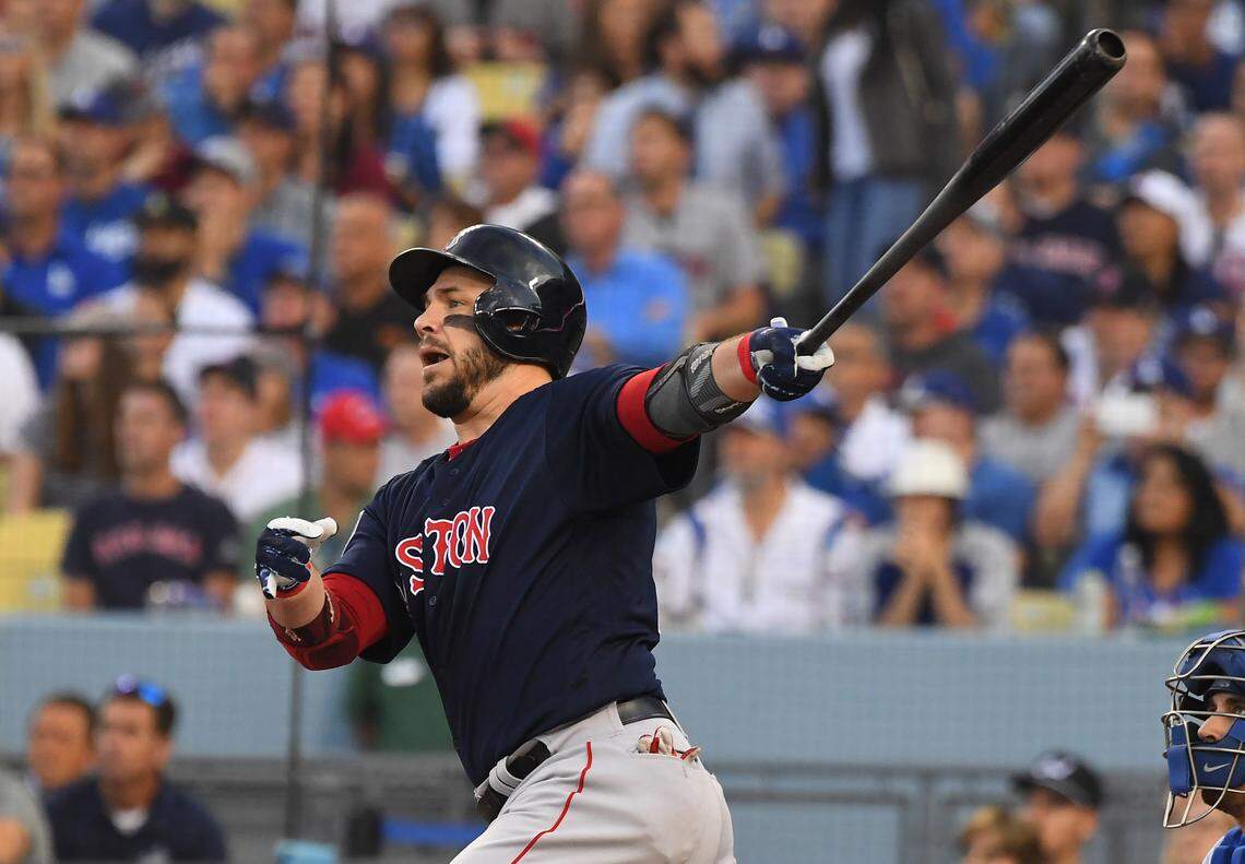 Boston Red Sox first baseman Steve Pearce hits a two-run home run against the Los Angeles Dodgers in the first inning in game five of the 2018 World Series at Dodger Stadium.