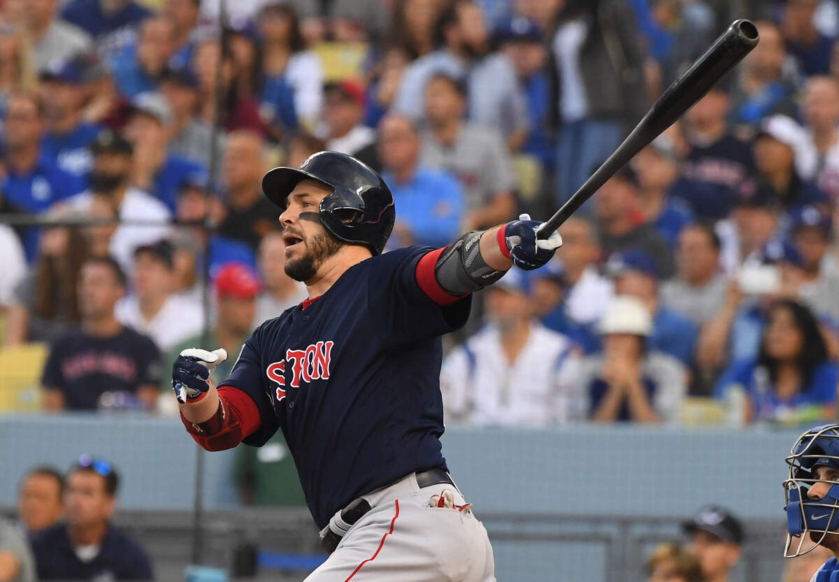 Boston Red Sox first baseman Steve Pearce hits a two-run home run against the Los Angeles Dodgers in the first inning in game five of the 2018 World Series at Dodger Stadium.