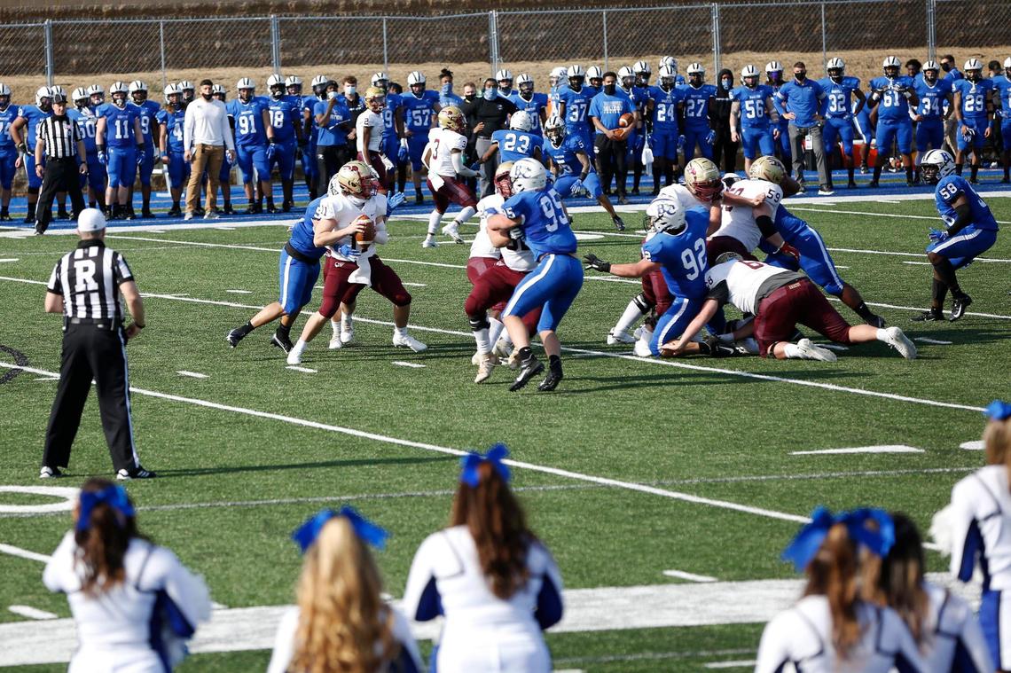 Erskine quarterback Craig Pender (11) gets sacked by Barton Bulldogs defensive end Dionte Osbey (55) in the second quarter of the game Saturday.