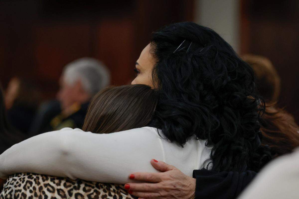 Rebecca Gutierrez, right, is embraced while listening to questioning during the trial of Thomas McDowell at the Lexington County Courthouse on Tuesday, Feb. 6, 2024. McDowell is charged with kidnapping and killing her sister, Jessica Gutierrez in 1986.
