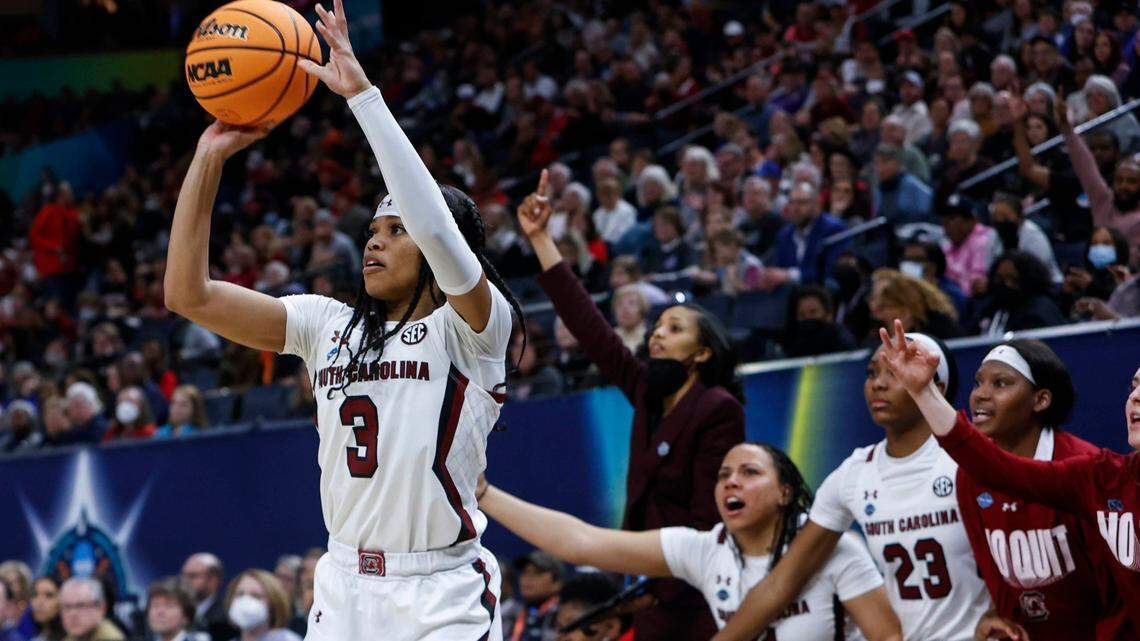 South Carolina’s Destanni Henderson (3) shoots a three-pointer in front of the Gamecock bench during the Final Four semifinals against Louisville at the Target Center in Minneapolis, Minn. on Friday, April 1, 2022.