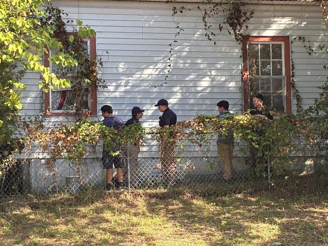 Members of the Columbia Police Department search for a missing woman.