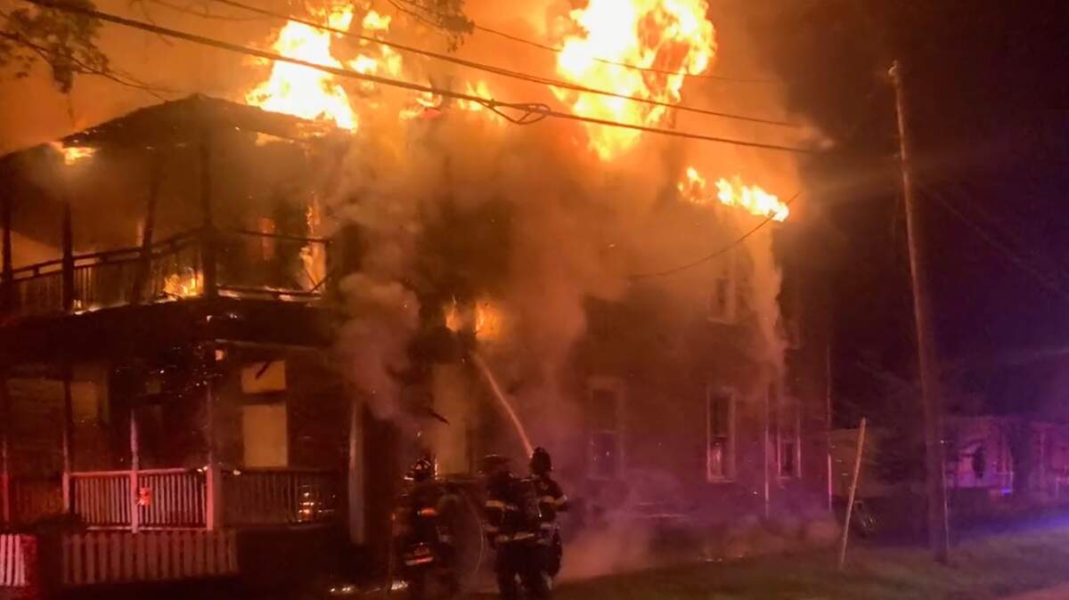 Columbia Fire Department crews work to put out a blazing fire early Monday morning off Barnwell Street.