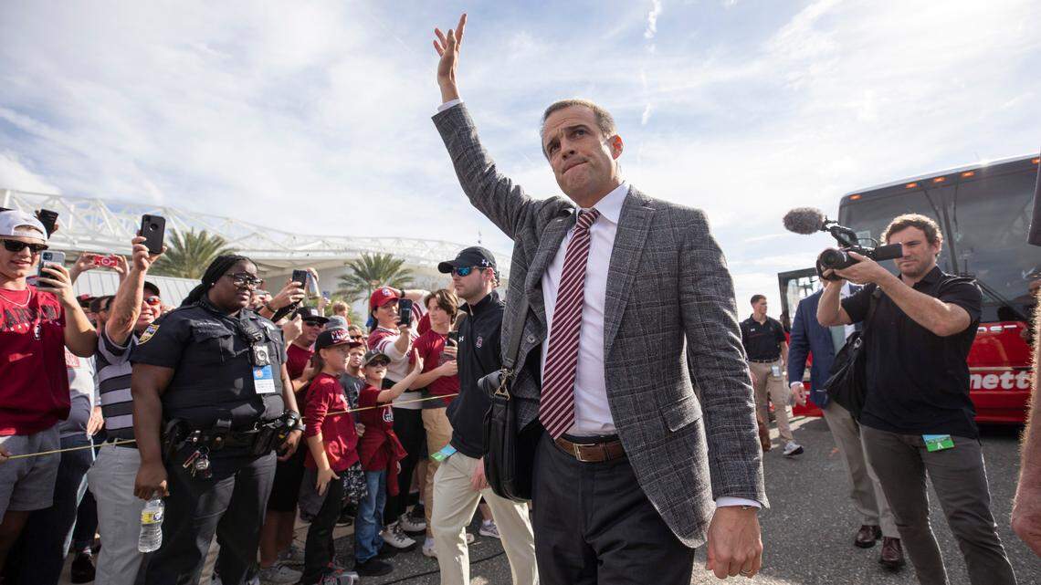 South Carolina head coach Shane Beamer recognizes the crowd as he enters the stadium before the Gator Bowl against Notre Dame at TIAA Bank Field in Jacksonville, FL on Friday, Dec. 30, 2022.
