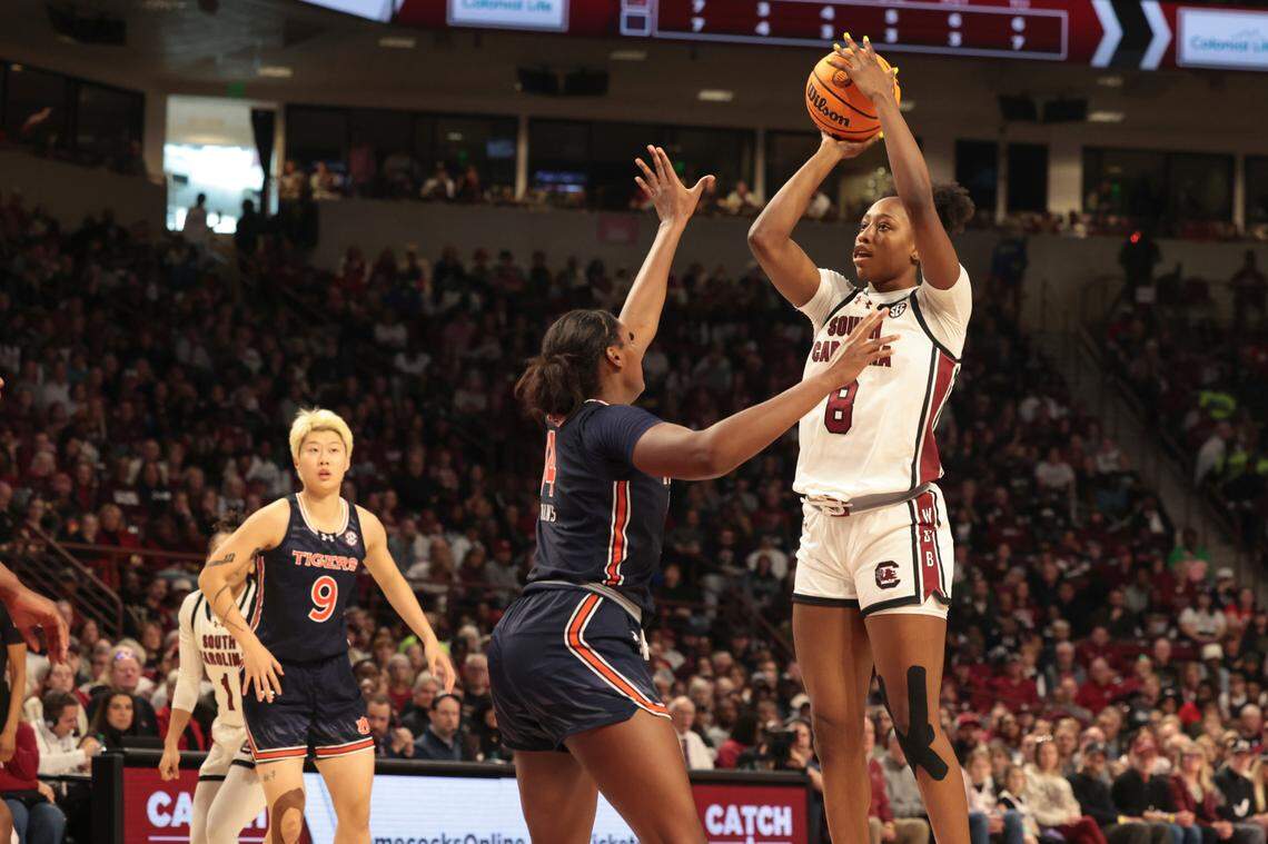 University of South Carolina’s Joyce Edwards (8) shoots as Auburn’s Taylen Collins (14) pressures during the first half of action in the Colonial Life Arena on Sunday, Feb. 2, 2025.