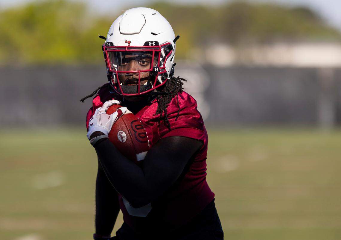 Gamecock wide receiver Dakereon Joyner (5) carries the ball during practice in Columbia on Tuesday, March 14, 2023.