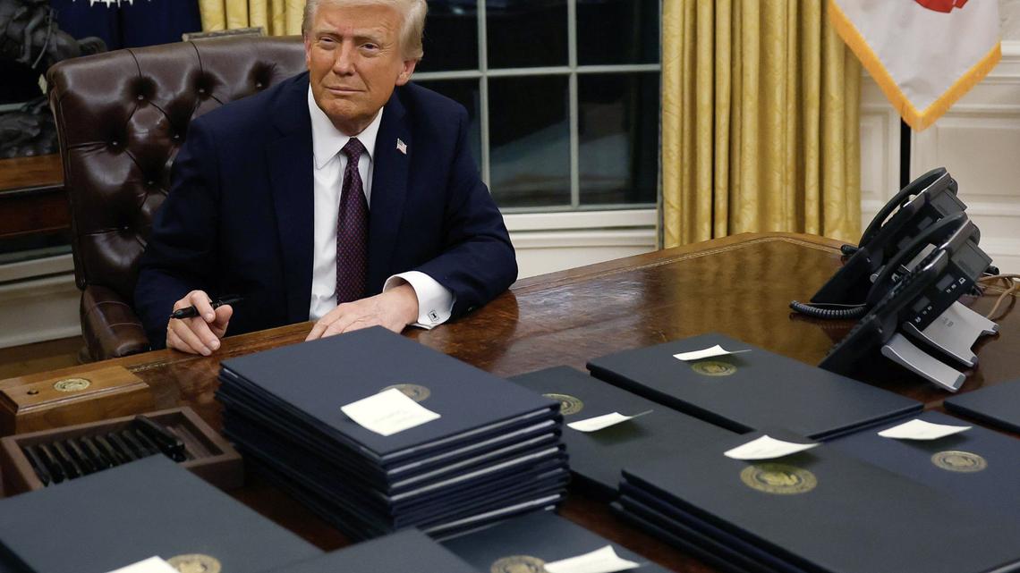 President Donald Trump signs executive orders in the Oval Office on Monday, Jan. 20, 2025, in Washington, D.C. Trump takes office for his second term as the 47th president of the United States. (Anna Moneymaker/Getty Images/TNS)
