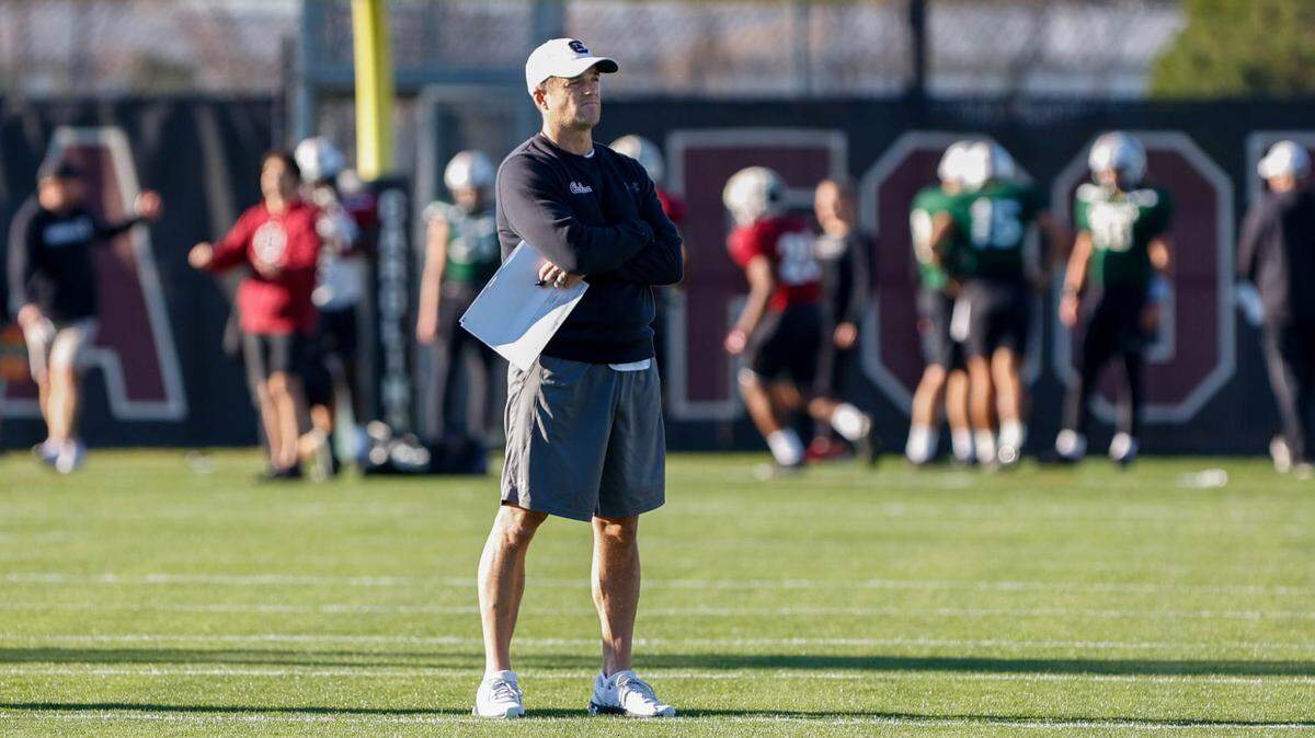South Carolina’s head coach Shane Beamer watches the team during an on-campus practice before the Duke’s Mayo Bowl.
