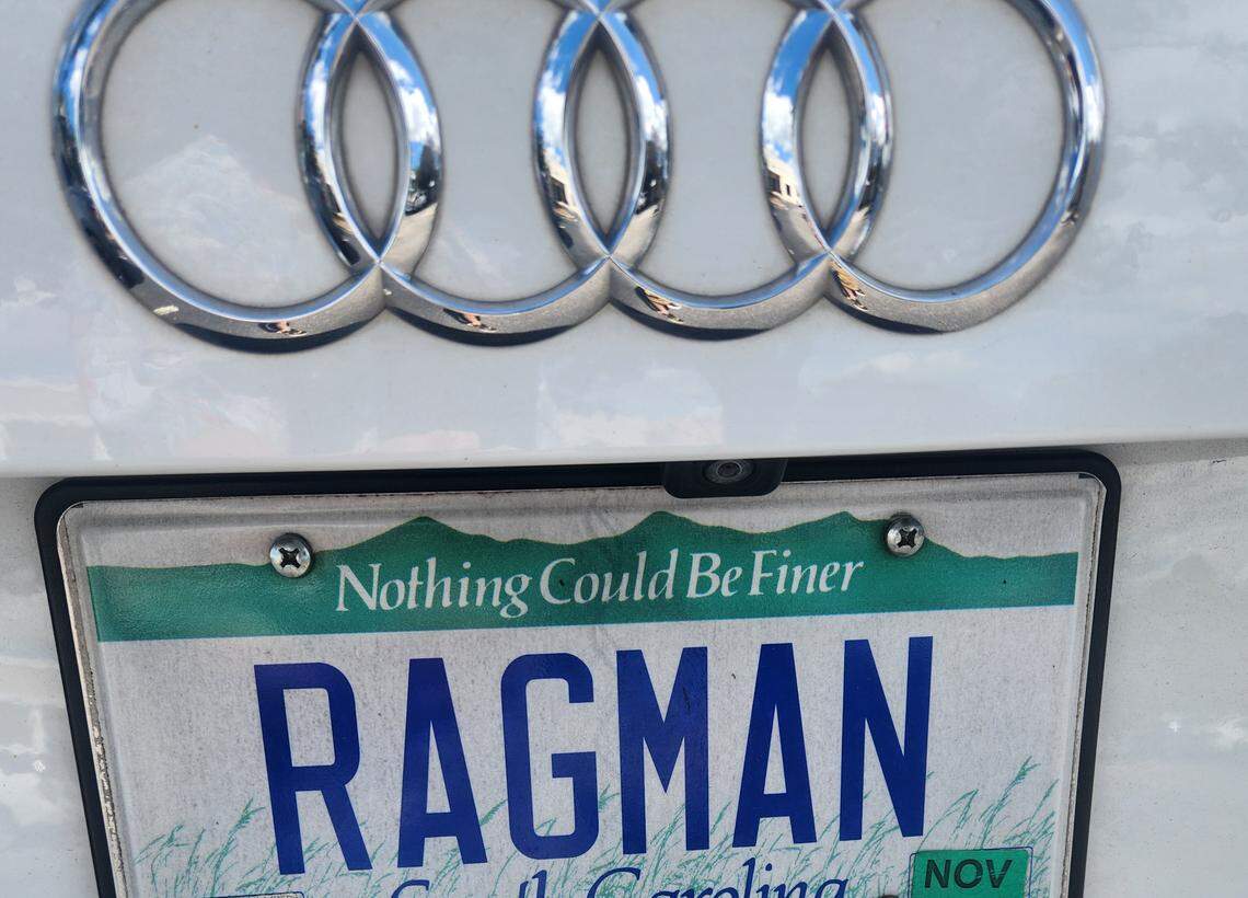 Perry Lancaster’s license plate says “RAGMAN,” a reference to his years in the clothing business.