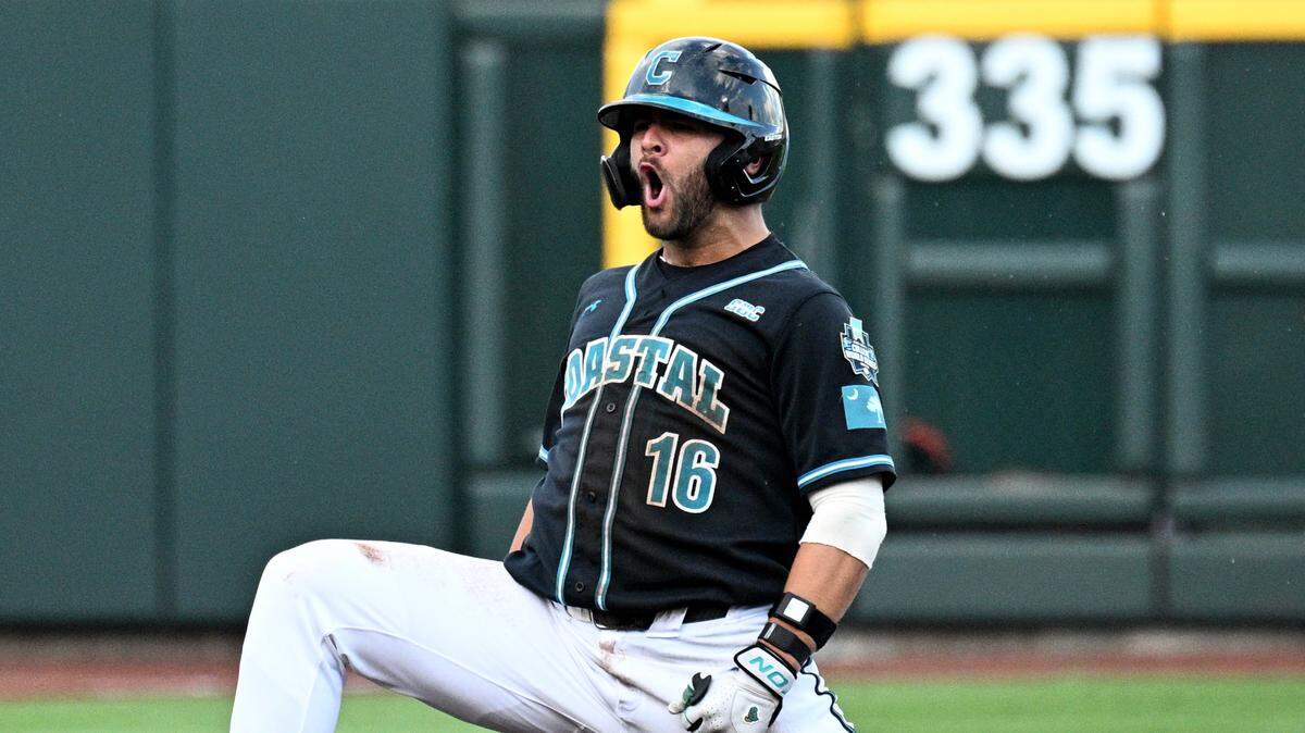 Coastal Carolina Chanticleers first baseman Colby Thorndyke (16) reacts to the dugout after hitting a RBI double against the Oregon State Beavers during the first inning at Charles Schwab Field.