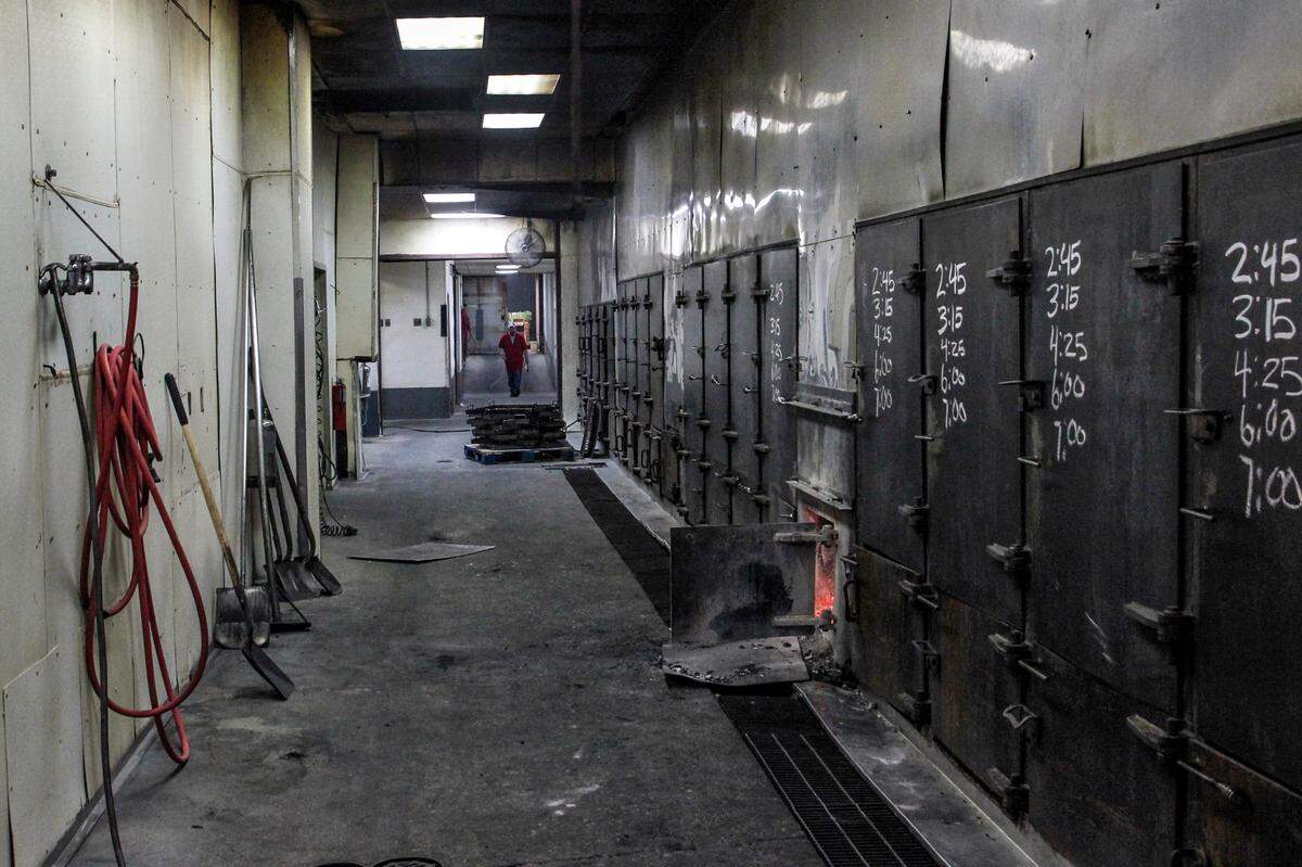 A hallway runs past the pits at Maurice’s Pigge Park BBQ. Oct. 11, 2023