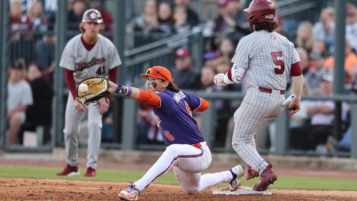 South Carolina catcher Talmadge LeCroy (5) beats out the throw to Clemson infielder Jacob Hinderleider (6) during the Gamecocks’ game against Clemson at Segra Park in Columbia on Saturday, March 2, 2024.